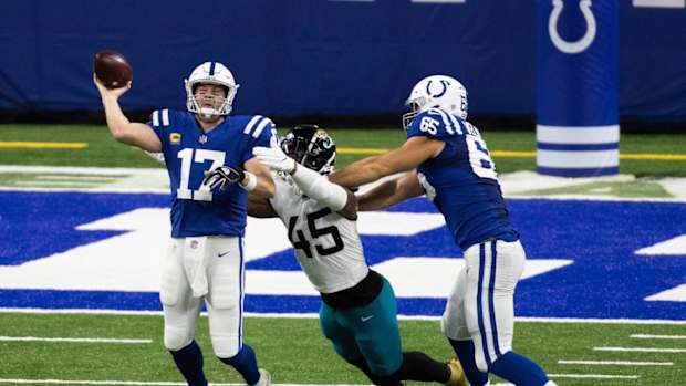 Indianapolis Colts offensive left tackle Jared Veldheer (65) blocks for quarterback Philip Rivers in Sunday's Week 17 home win over the Jacksonville Jaguars. Veldheer had two days of practice after not playing all season and was pressed into starting.